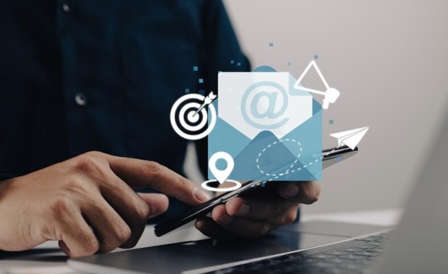 How FiChecks Simplifies eCheck Transactions A Person Using FiChecks on a Mobile Device to Manage Check Payments Conveniently from Anywhere