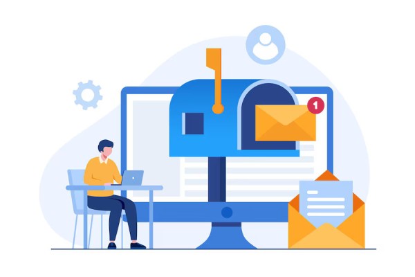 Convenient Check Emailing and Mailing A Person Working on a Laptop with a Large Mailbox on the Screen, Representing Email Check Delivery