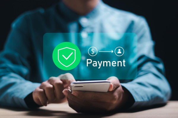 Have All Transactions in One Place User Navigating Various Payment Tools Within the FiChecks Interface on a Laptop