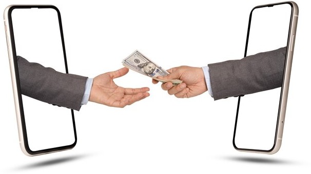 Various Ways to Send Money Today Two Hands Extend from Opposite Sides of Two Smartphones, One Handing Over a Stack of Cash, Symbolizing Digital Transactions