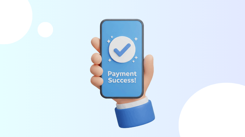 Hand Holding Smartphone Displaying "Payment Success!" with a Blue Checkmark on a Light Blue Background
